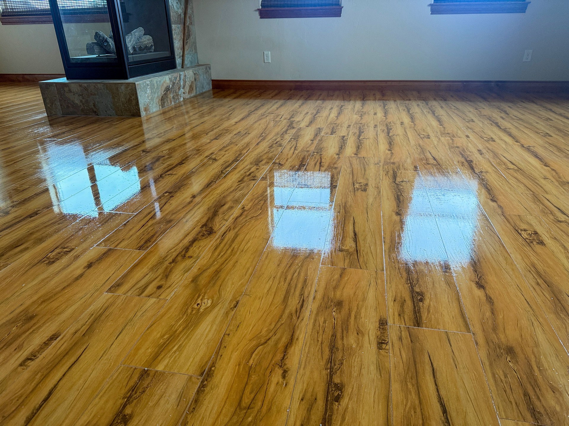 Gleaming wooden flooring. Newly refinished hardwood with natural light reflection.